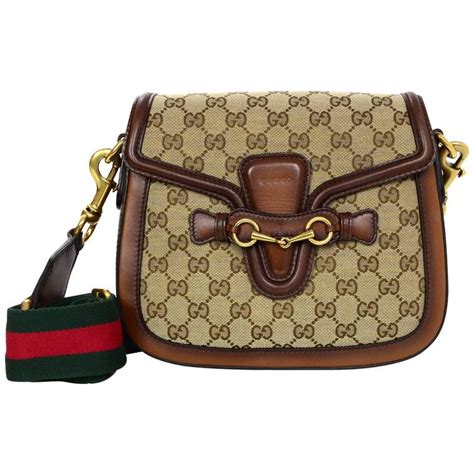 gucci monogram crossbody sling|Gucci monogram gifts.